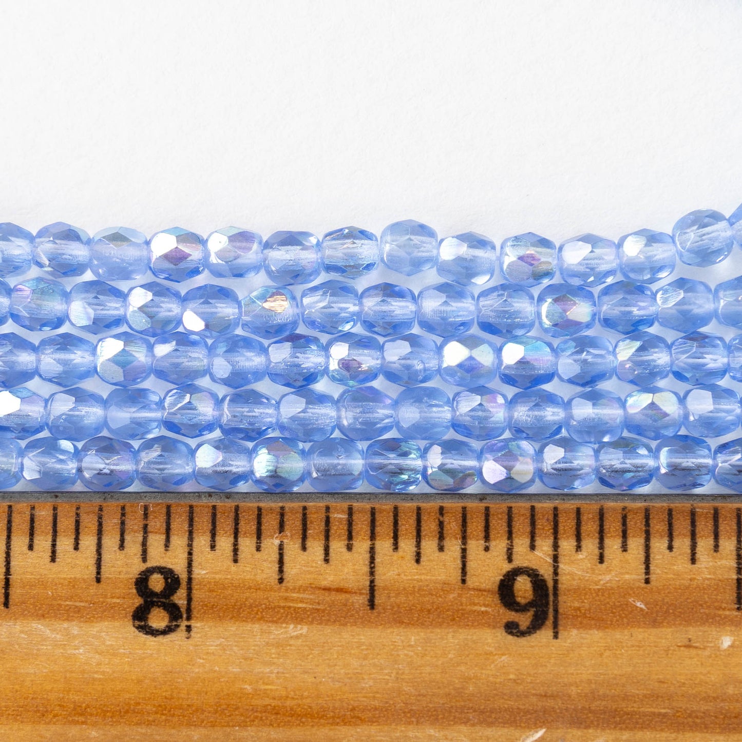 4mm Round Faceted Glass Beads - Transparent Sapphire Blue AB - 50 Beads