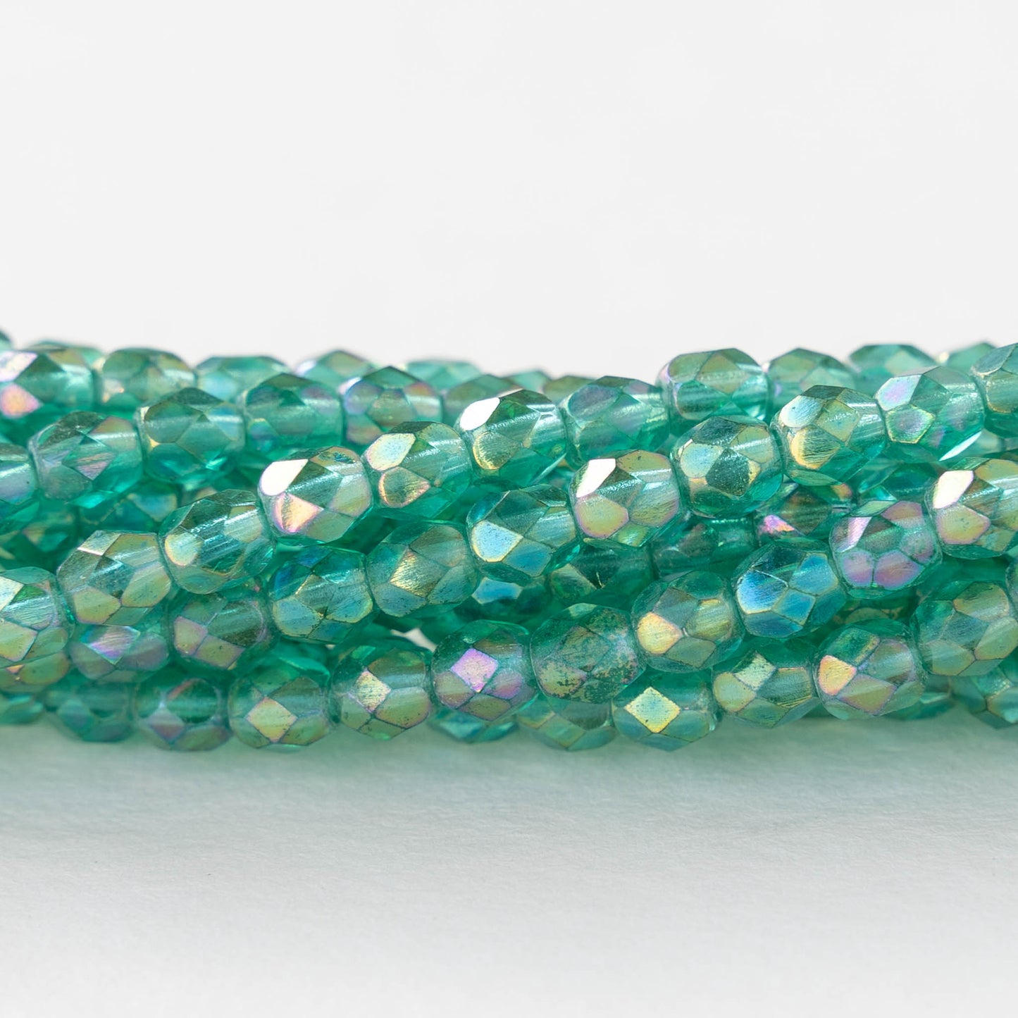 4mm Round Faceted Glass Beads - Transparent Emerald Luster - 50 Beads