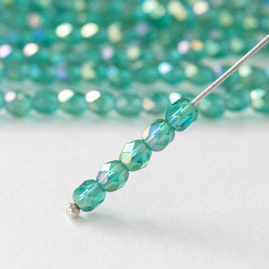 4mm Round Faceted Glass Beads - Transparent Emerald Luster - 50 Beads