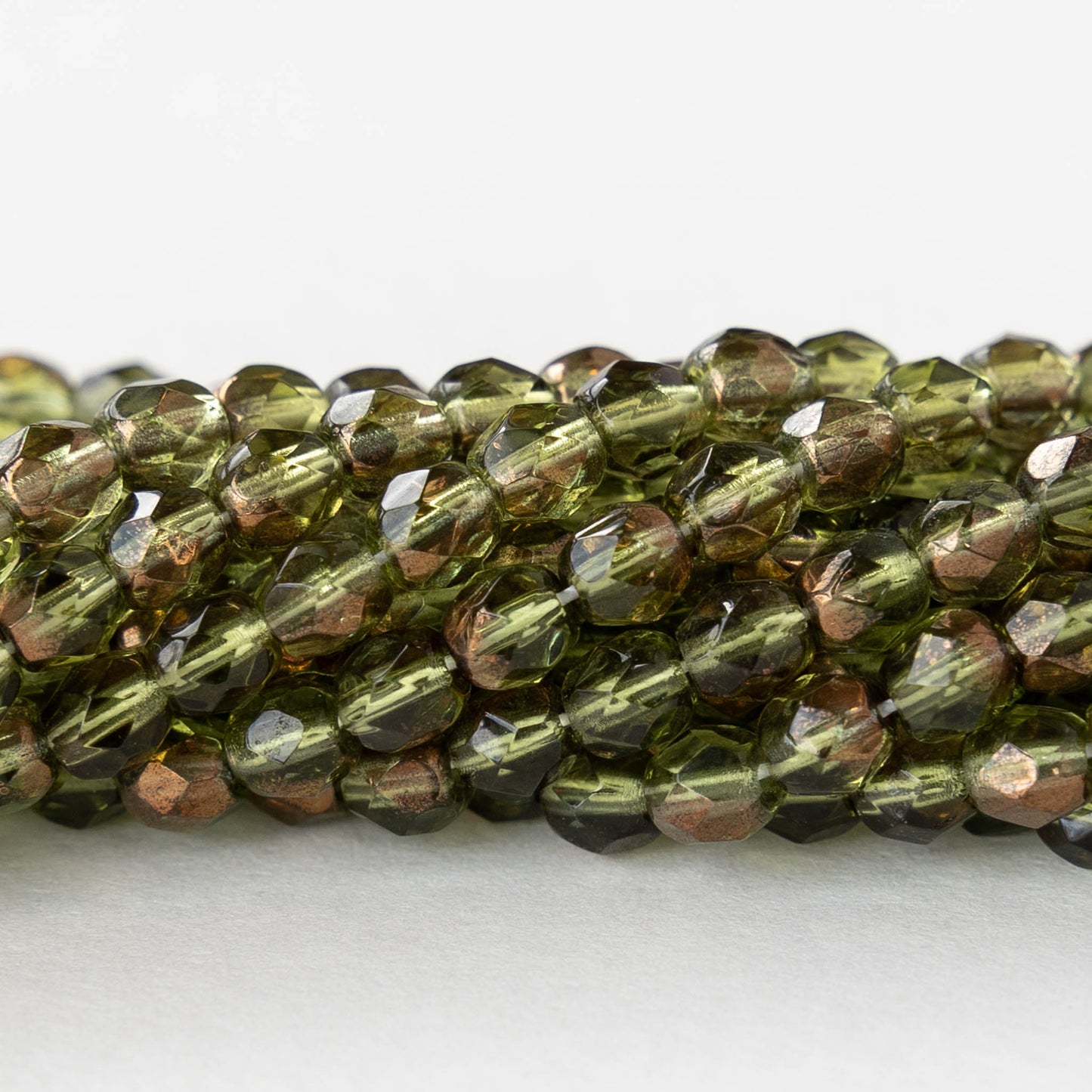 4mm Round Faceted Glass Beads - Transparent Olivine with Bronze - 50 Beads