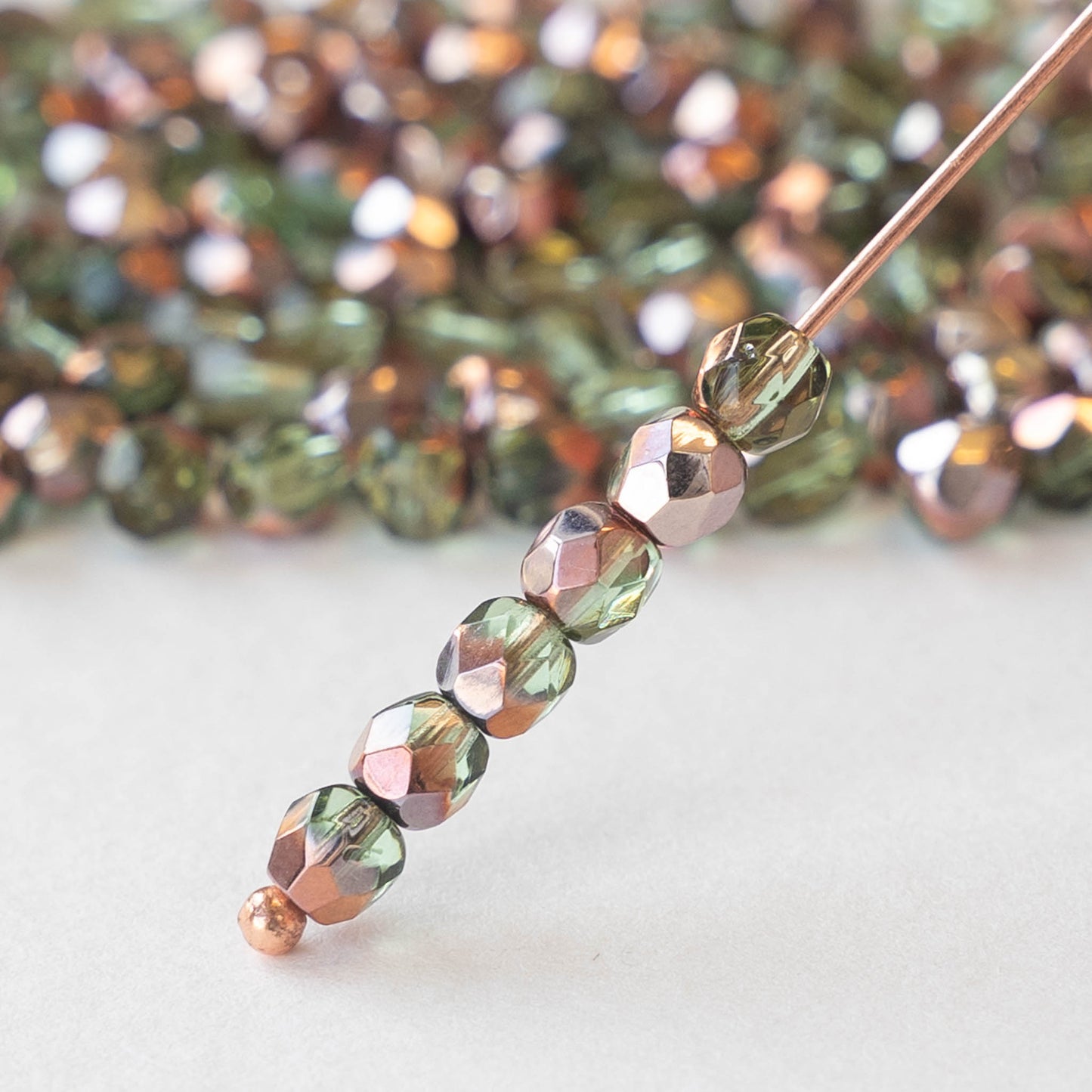 4mm Faceted Round Beads - Peridot Green with Copper - 100 beads