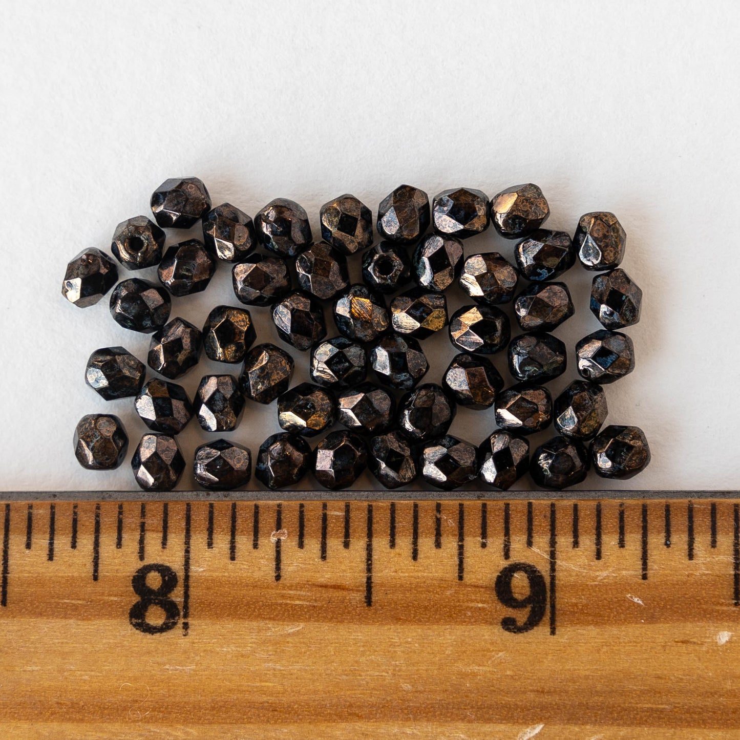 4mm Round Faceted Beads - Black Bronze Picasso - 50