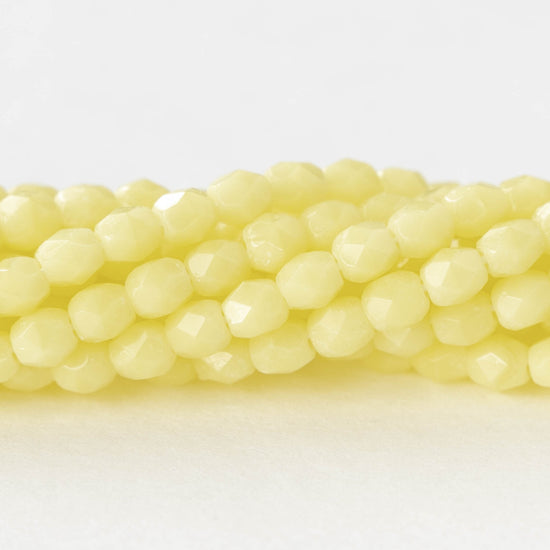 4mm Faceted Round Beads - Opaque Pale Yellow  - 50 beads