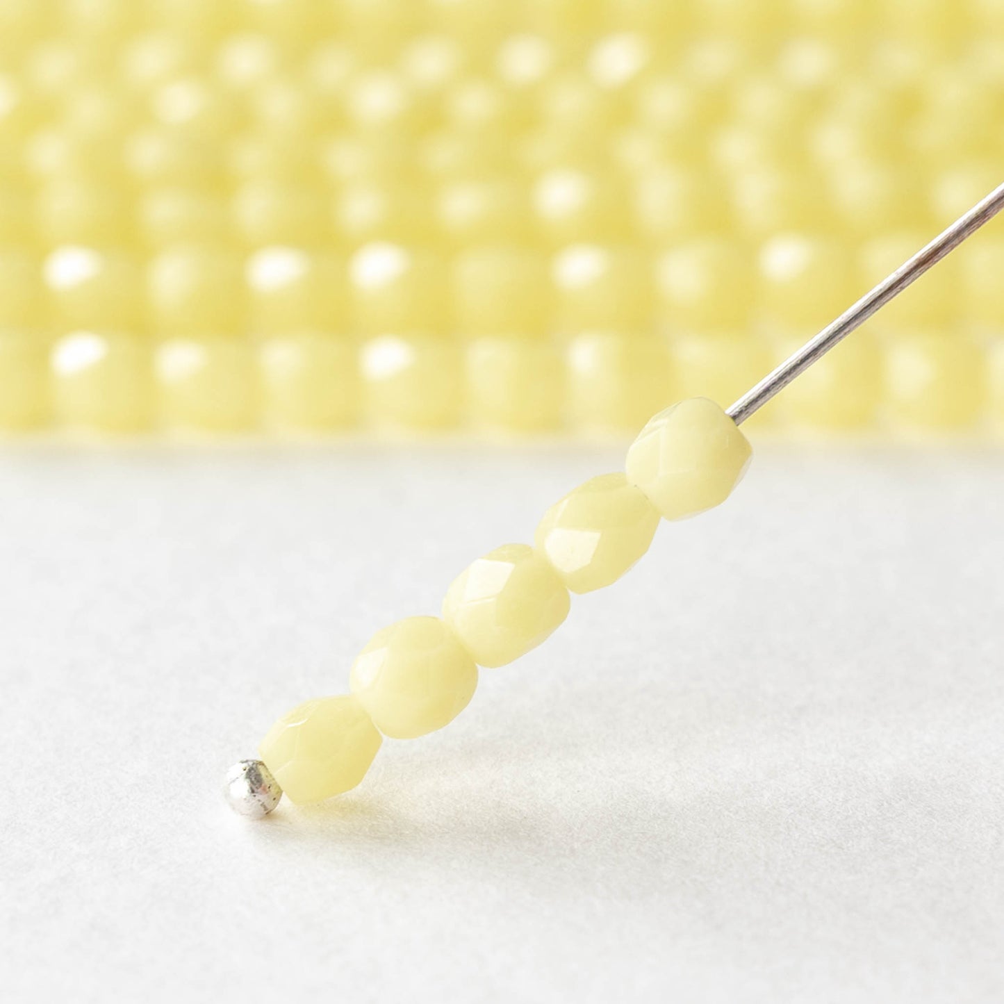 4mm Faceted Round Beads - Opaque Pale Yellow  - 50 beads