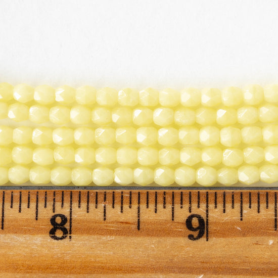 4mm Faceted Round Beads - Opaque Pale Yellow  - 50 beads