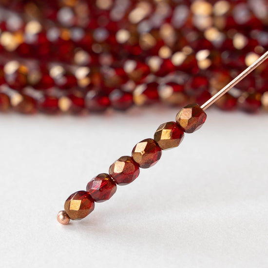 4mm Round Faceted Glass Beads - Transparent Red with Bronze - 50 Beads