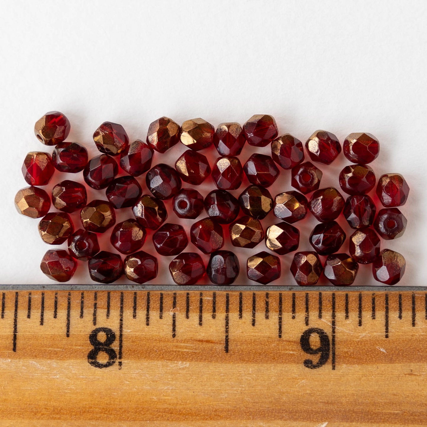 4mm Round Faceted Glass Beads - Transparent Red with Bronze - 50 Beads