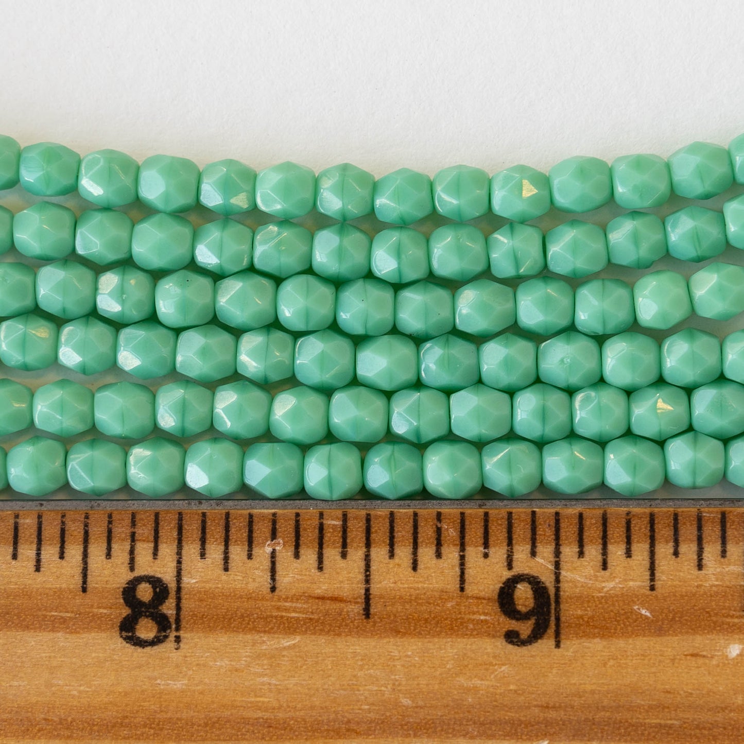 4mm Faceted Round Glass Beads - Opaque Green - 100 beads