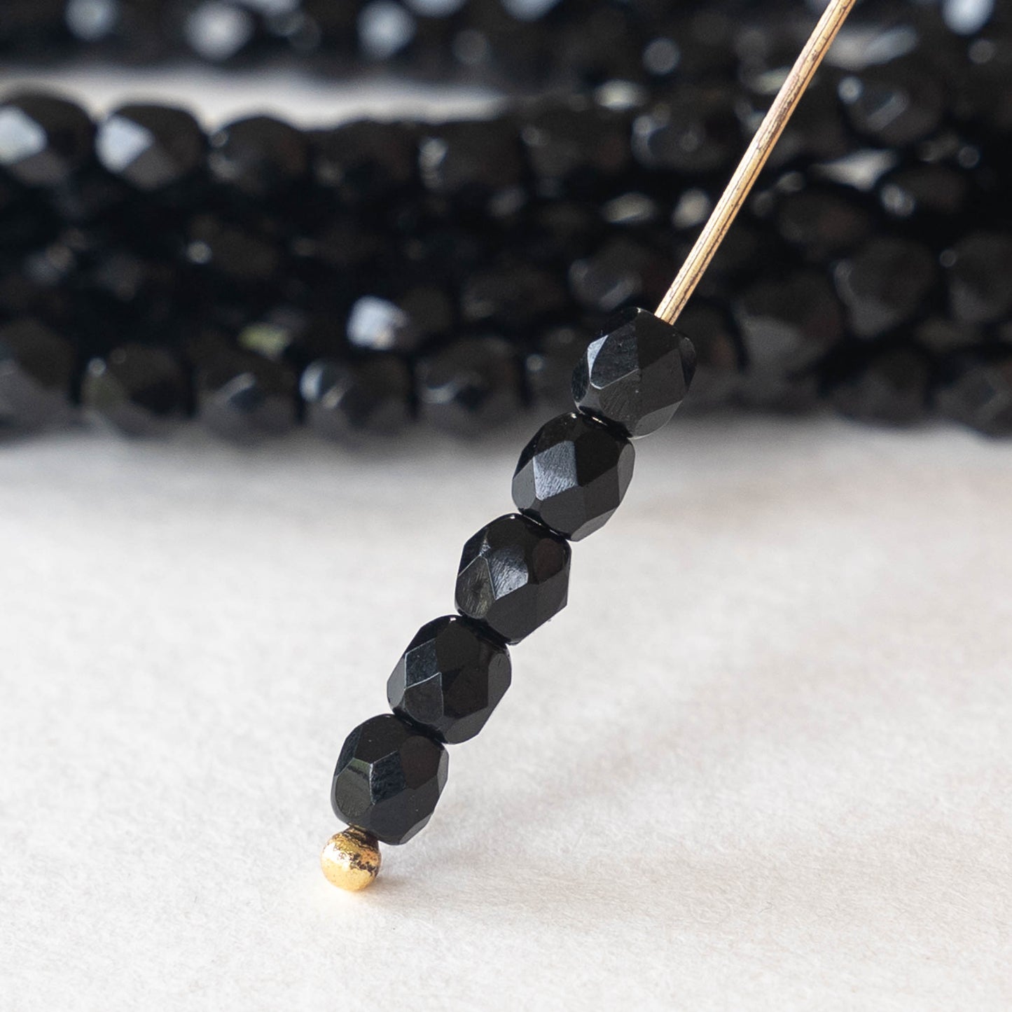 4mm Faceted Round Beads - Opaque Black - 50 beads