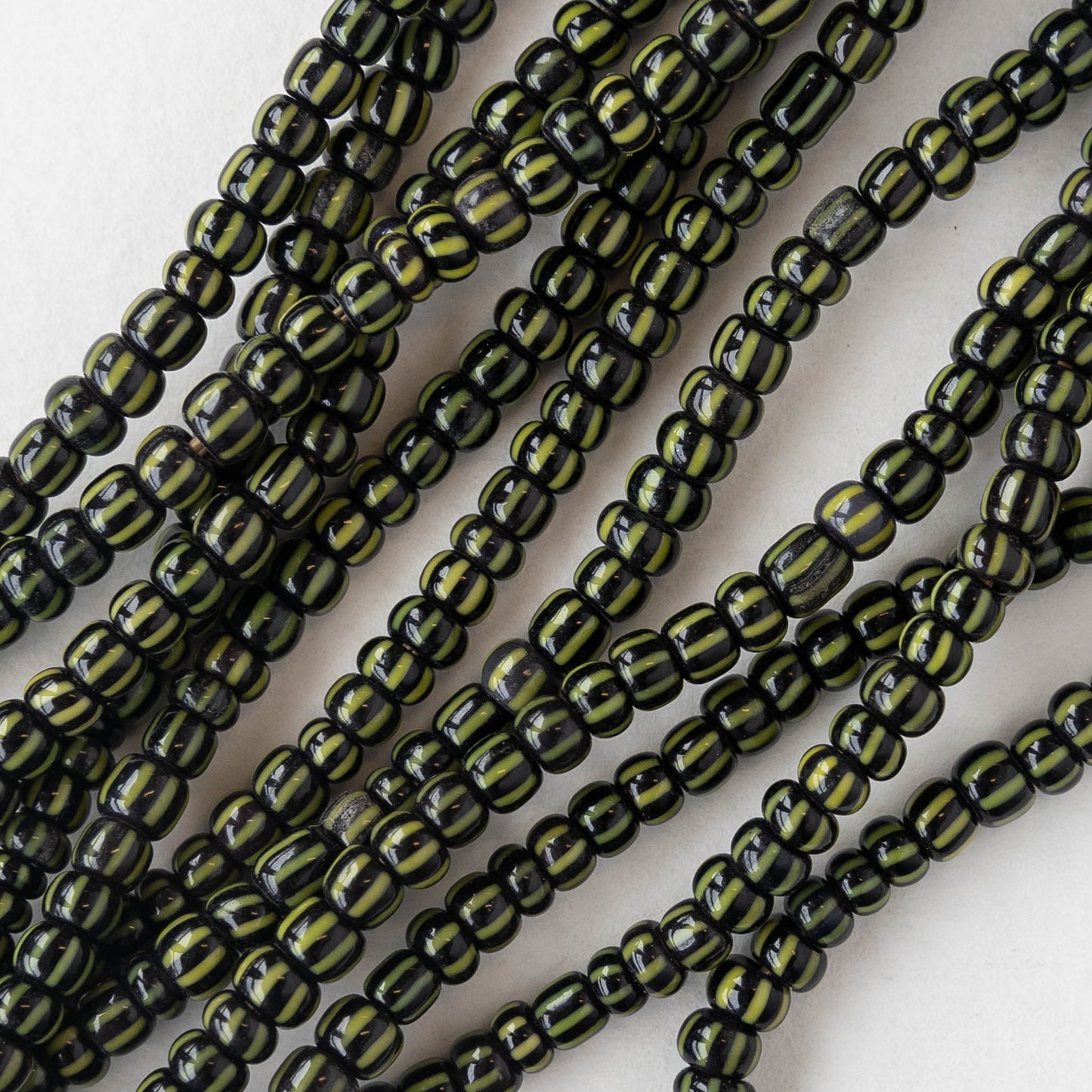 Seed Beads - Black and Green Stripes - 14 Inch Strand