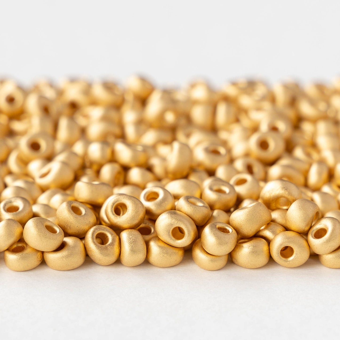 4mm Glass Magatama Teardrops - Matte Gold Plated - 5 grams