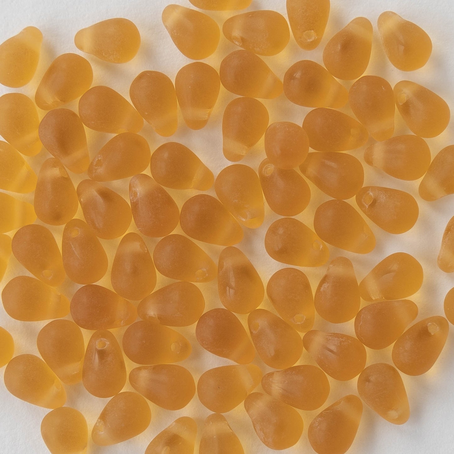 4x6mm Frosted Glass Teardrops - Amber Topaz - 100 Beads