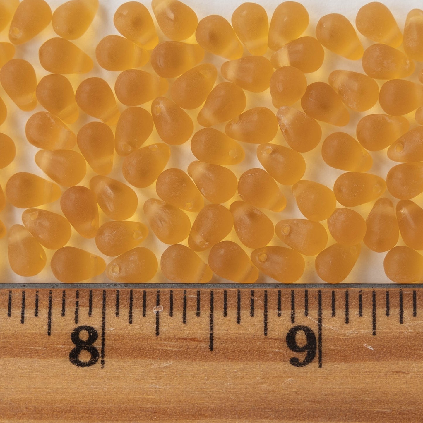 4x6mm Frosted Glass Teardrops - Amber Topaz - 100 Beads