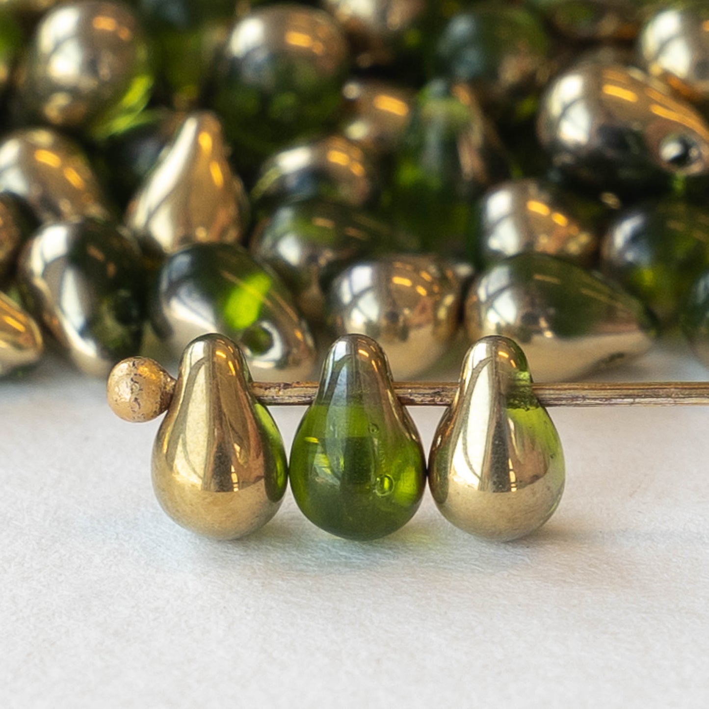 Load image into Gallery viewer, 6x4mm Glass Teardrop Beads - Peridot Green with Gold - 100 Beads
