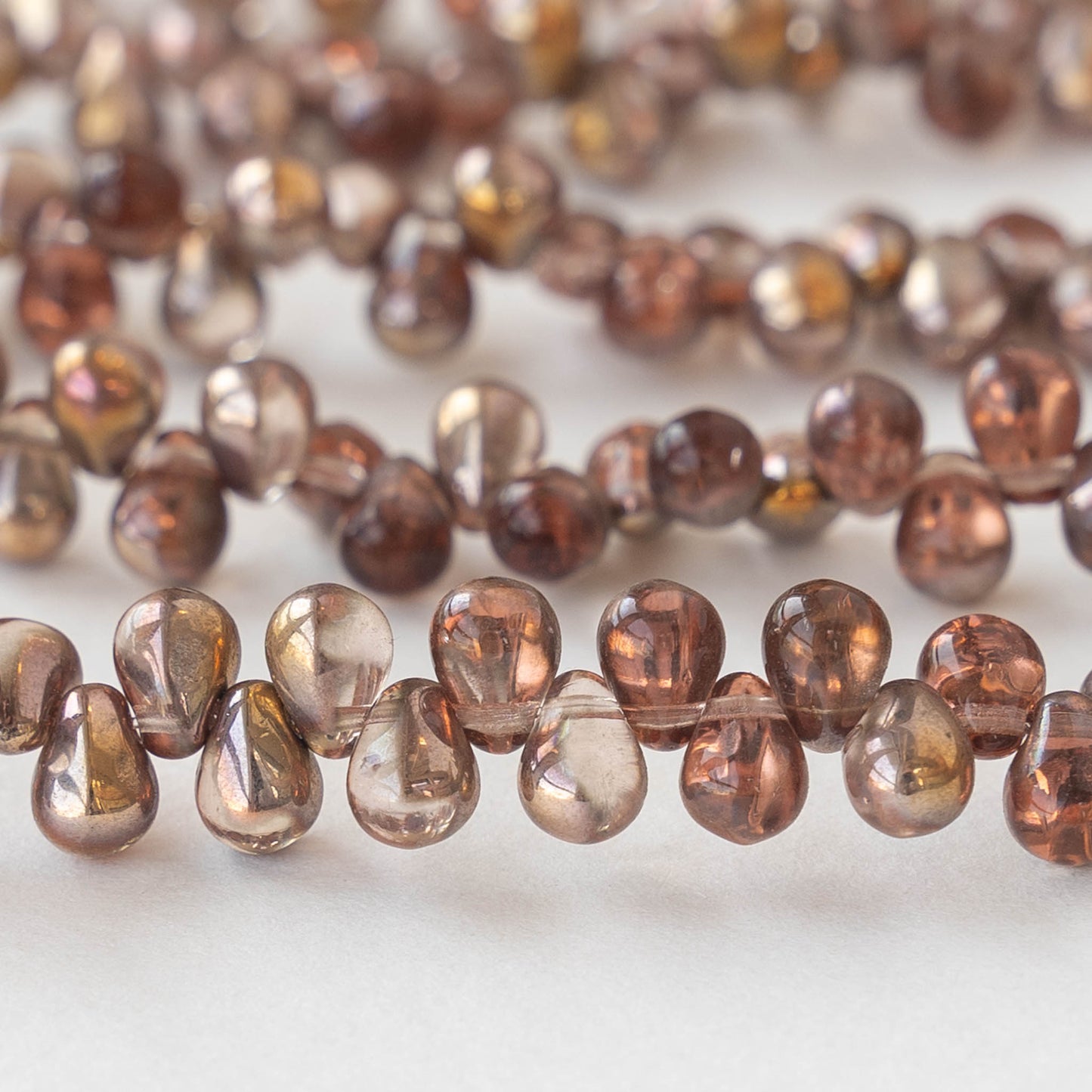 4x6mm Glass Teardrop Beads -  Light Pink with a Metallic Silvery Gold - 100 Beads