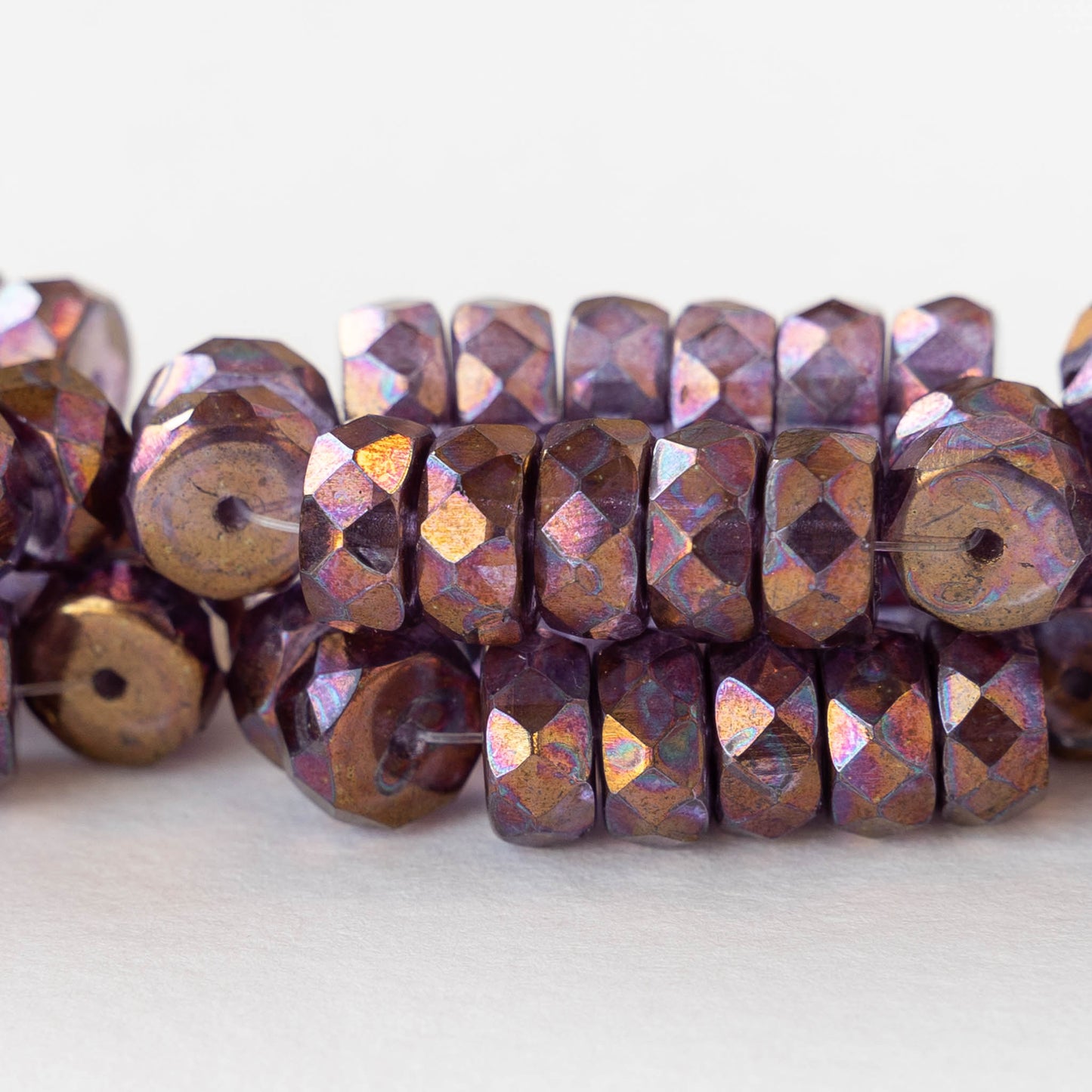 4x8mm Firepolished Glass Heishi Beads - Tanzanite with a Copper Finish - 10 Beads