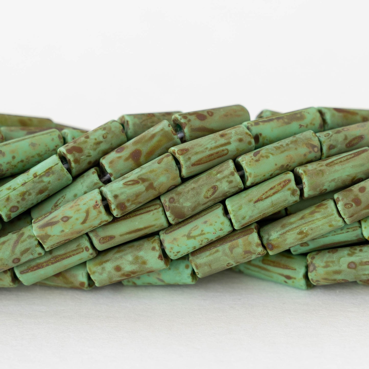 9x4mm Glass Tube Beads - Green Picasso Matte - 20 inches