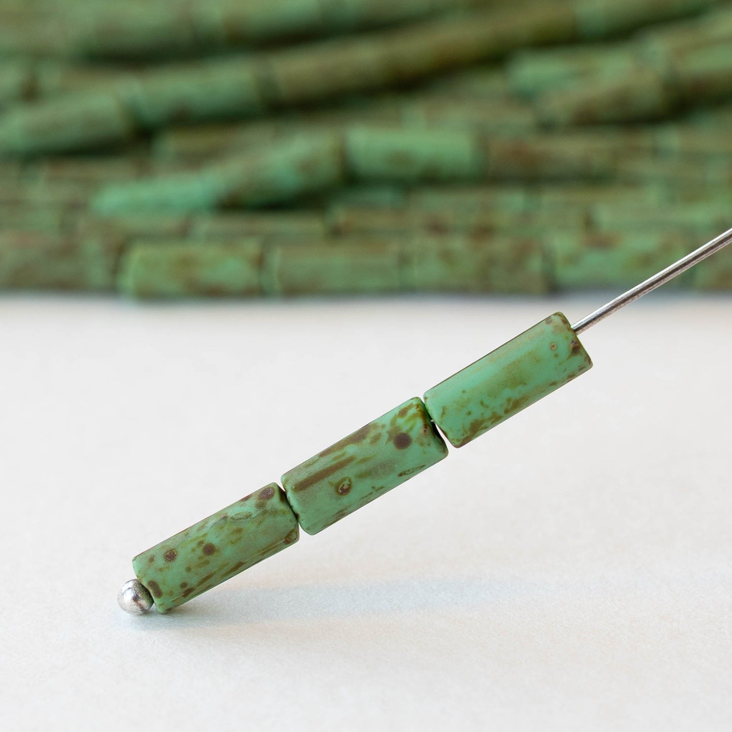 4x9mm Glass Bugle Beads - Matte Opaque Jade Picasso - 20 inch strand ~60 beads