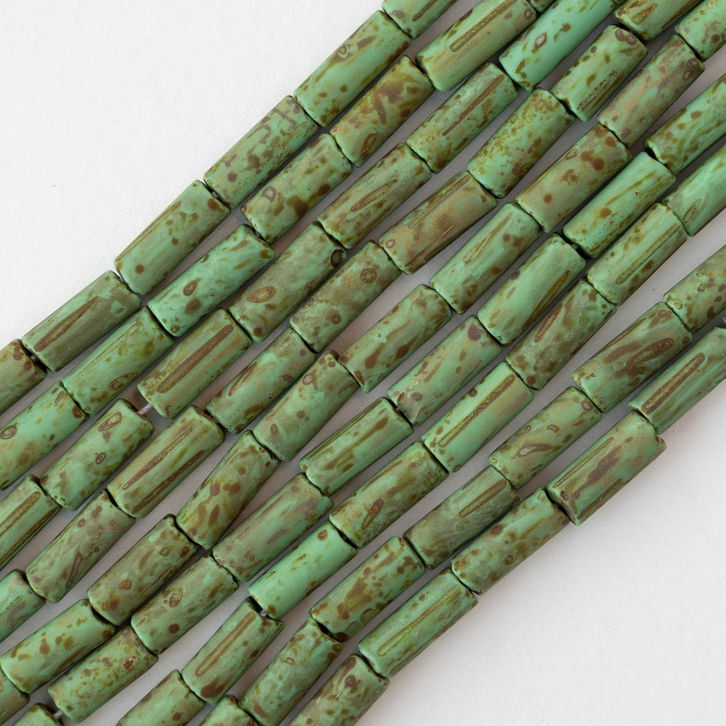 4x9mm Glass Bugle Beads - Matte Opaque Jade Picasso - 20 inch strand ~60 beads