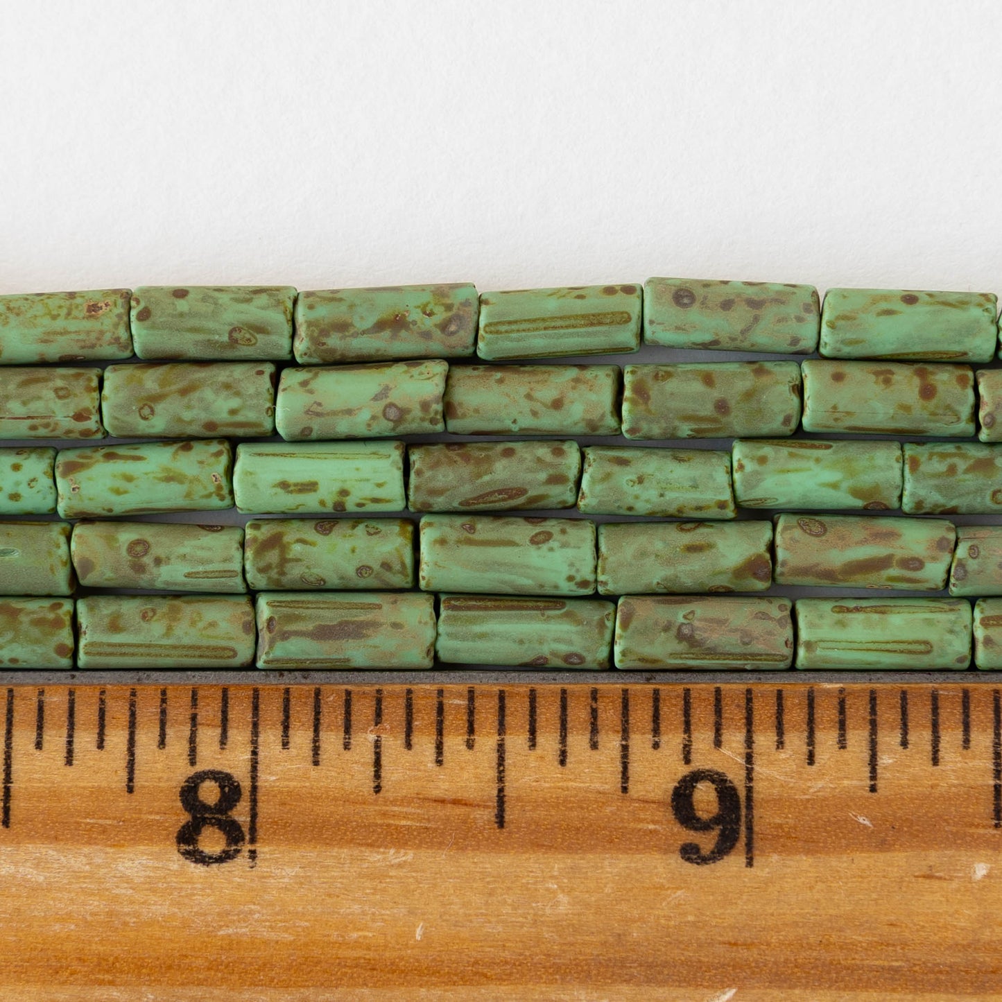 4x9mm Glass Bugle Beads - Matte Opaque Jade Picasso - 20 inch strand ~60 beads