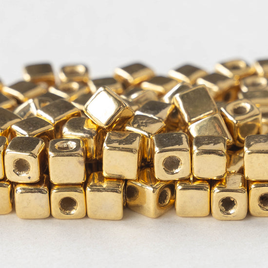 Load image into Gallery viewer, 5.5mm 24K Gold Coated Ceramic Cube Beads - Gold - 10 or 30
