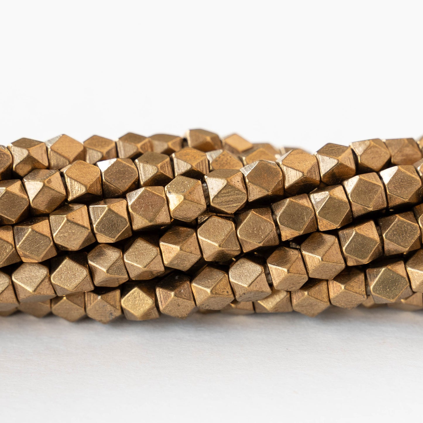 5mm Cornerless Cube Beads - Brass - 25 beads