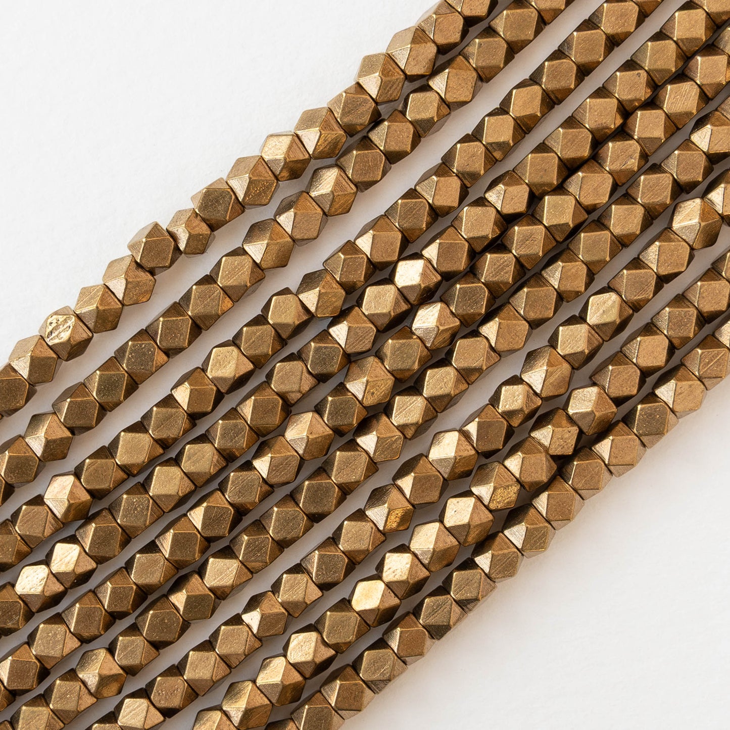5mm Cornerless Cube Beads - Brass - 25 beads