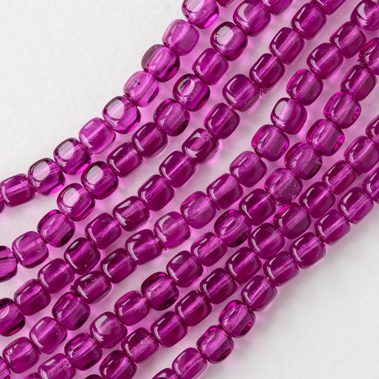 5mm Glass Cube Beads - Transparent Magenta - 15 inch strand - 80 beads