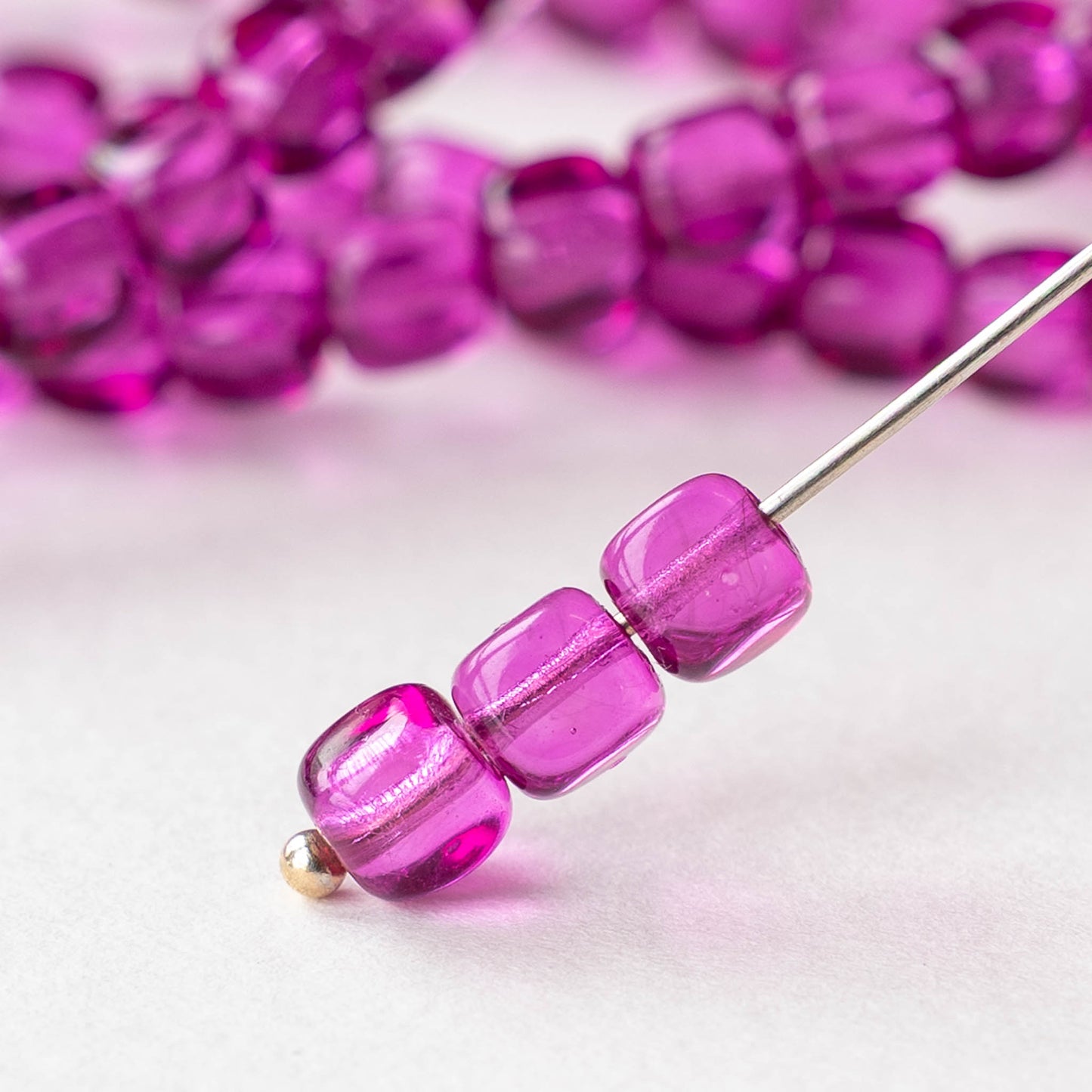 5mm Glass Cube Beads - Transparent Magenta - 15 inch strand - 80 beads
