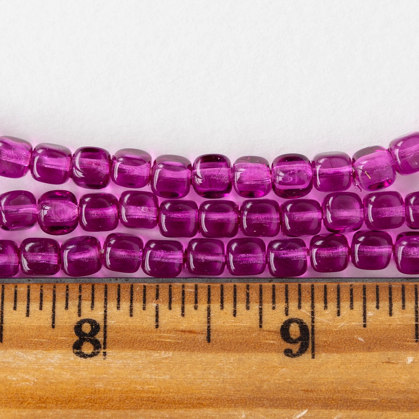 5mm Glass Cube Beads - Transparent Magenta - 15 inch strand - 80 beads