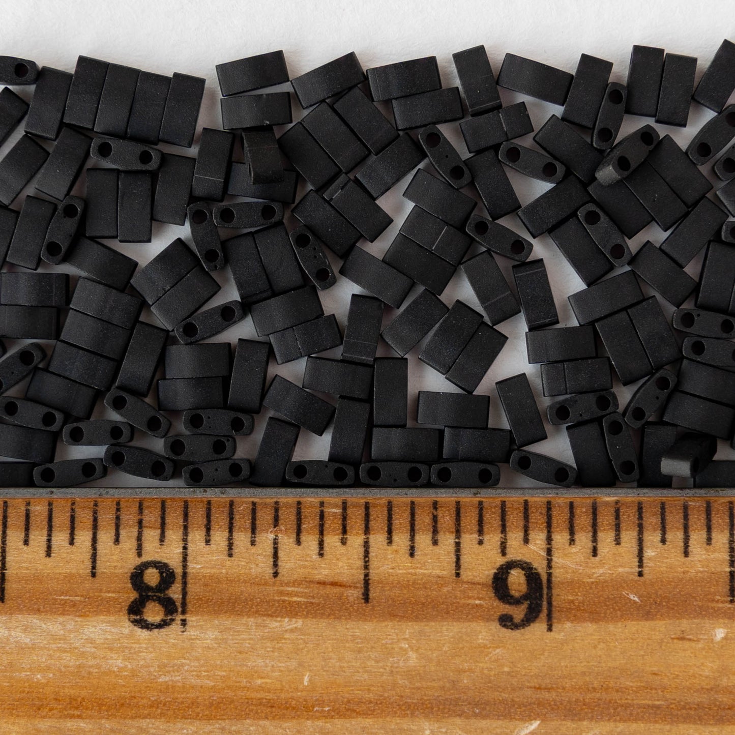 5mm Half Tila Beads - Opaque Black Matte - 5 grams ~125 beads