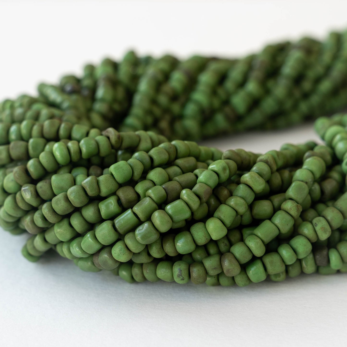 Rustic Indonesian Seed Beads - Opaque Green - 42 inches