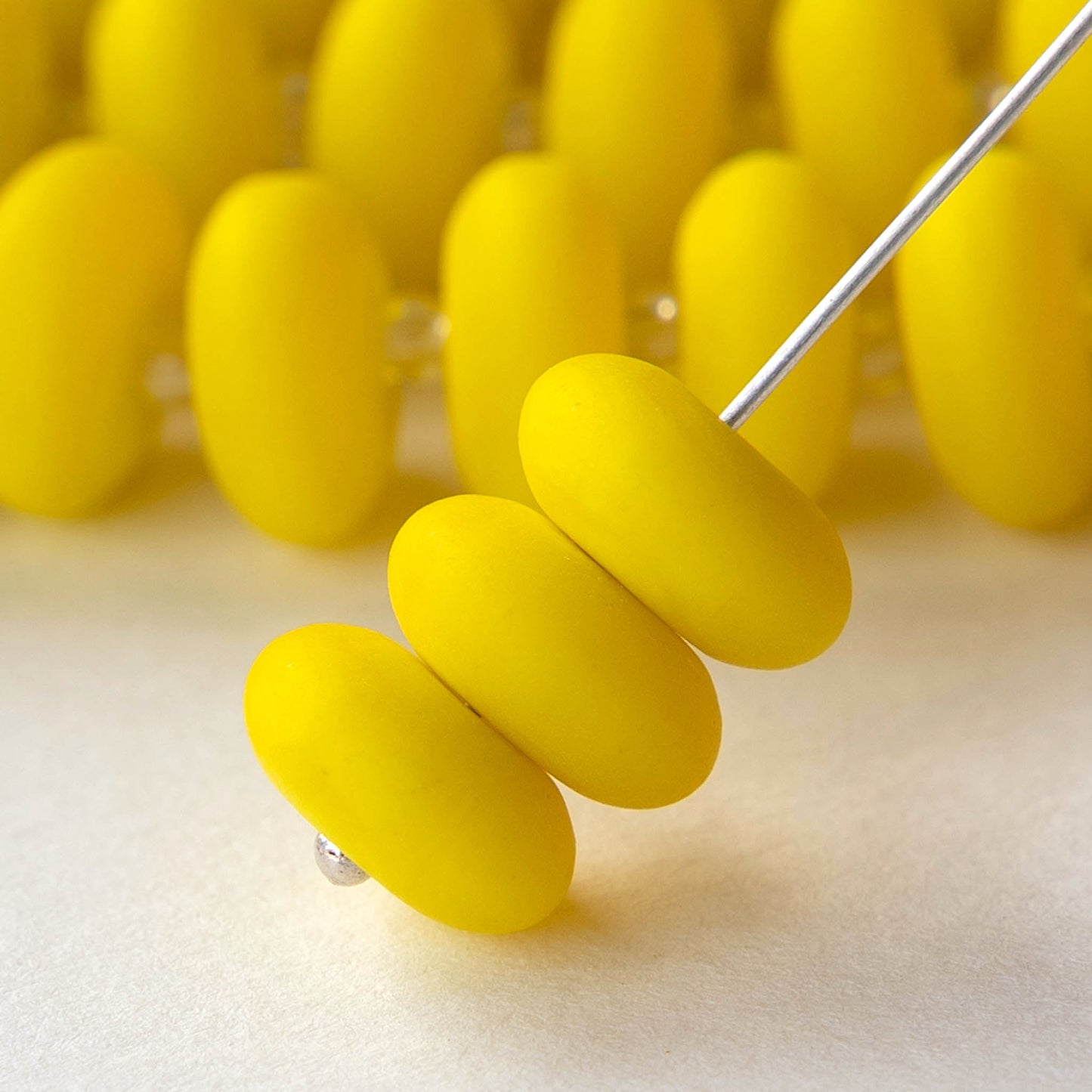 Load image into Gallery viewer, 5x12mm Frosted Glass Rondelle - Opaque Yellow - 28 Beads
