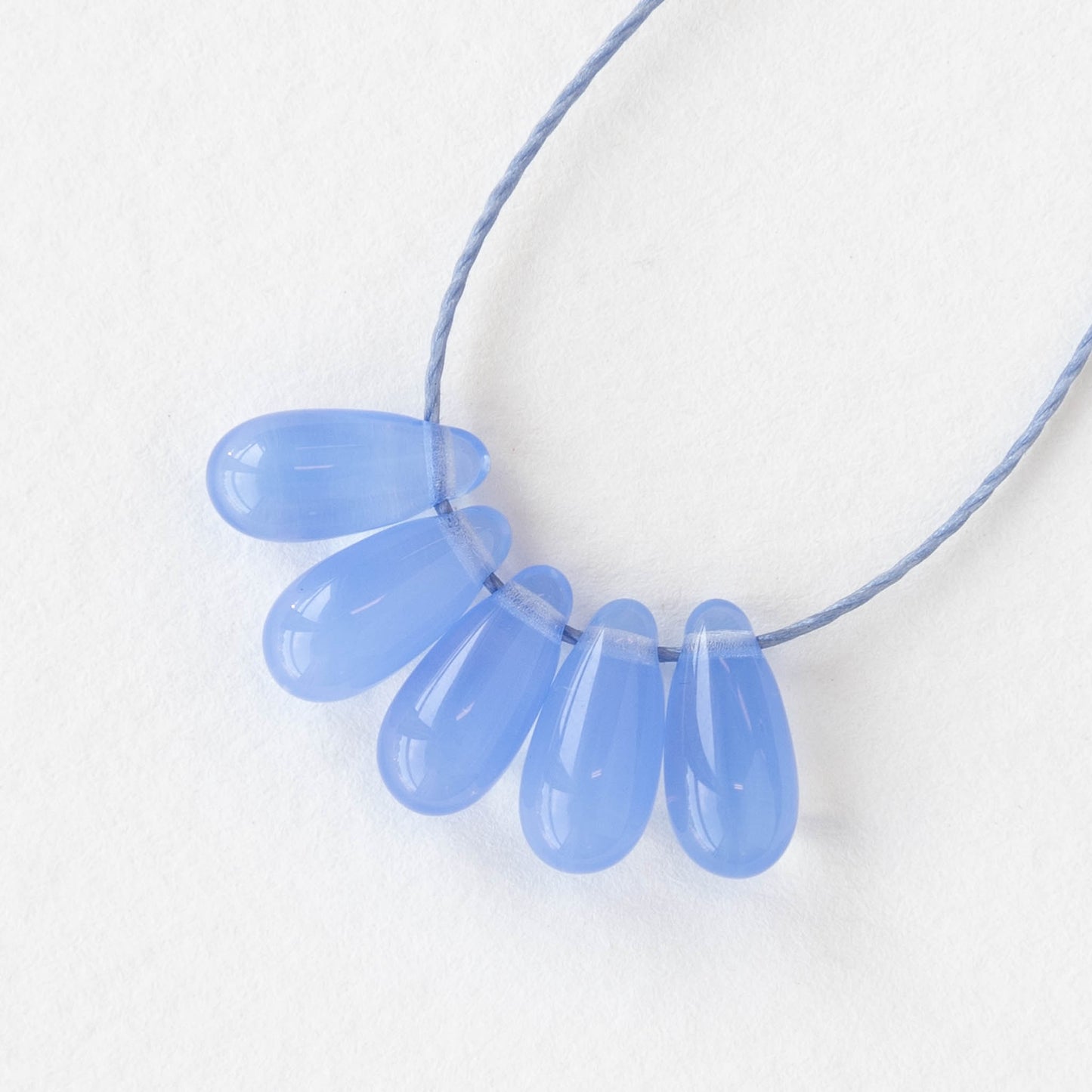 5x12mm Glass Teardrop Beads - Cornflower Blue Opaline - 50 beads