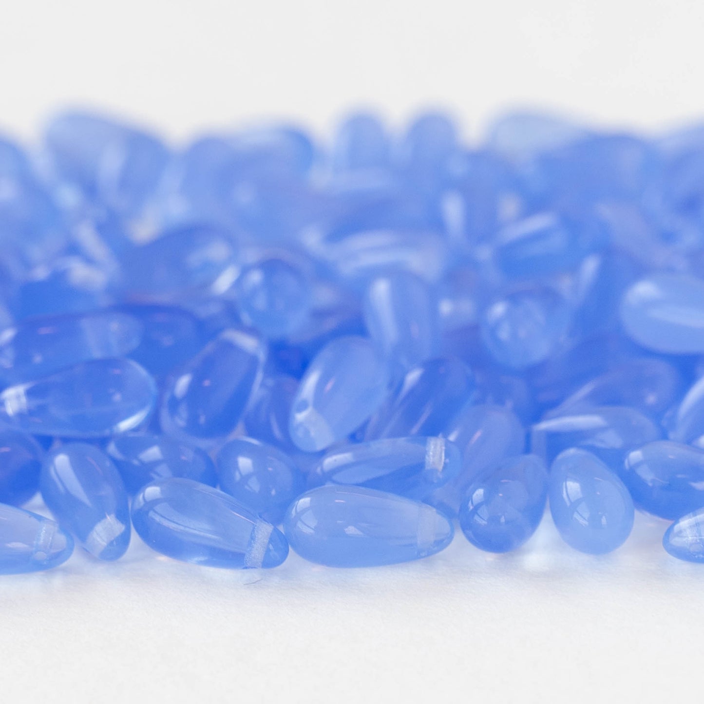 5x12mm Glass Teardrop Beads - Cornflower Blue Opaline - 50 beads