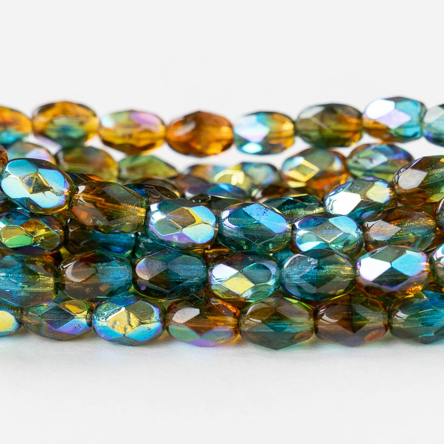 5x7mm Firepolished Glass Oval Beads - Teal Yellow Green AB Luster - 10 or 20 beads