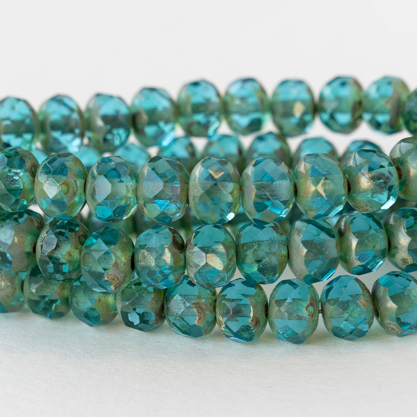 5x7mm Faceted Rondelle Beads - Transparent Teal Picasso - 25 beads