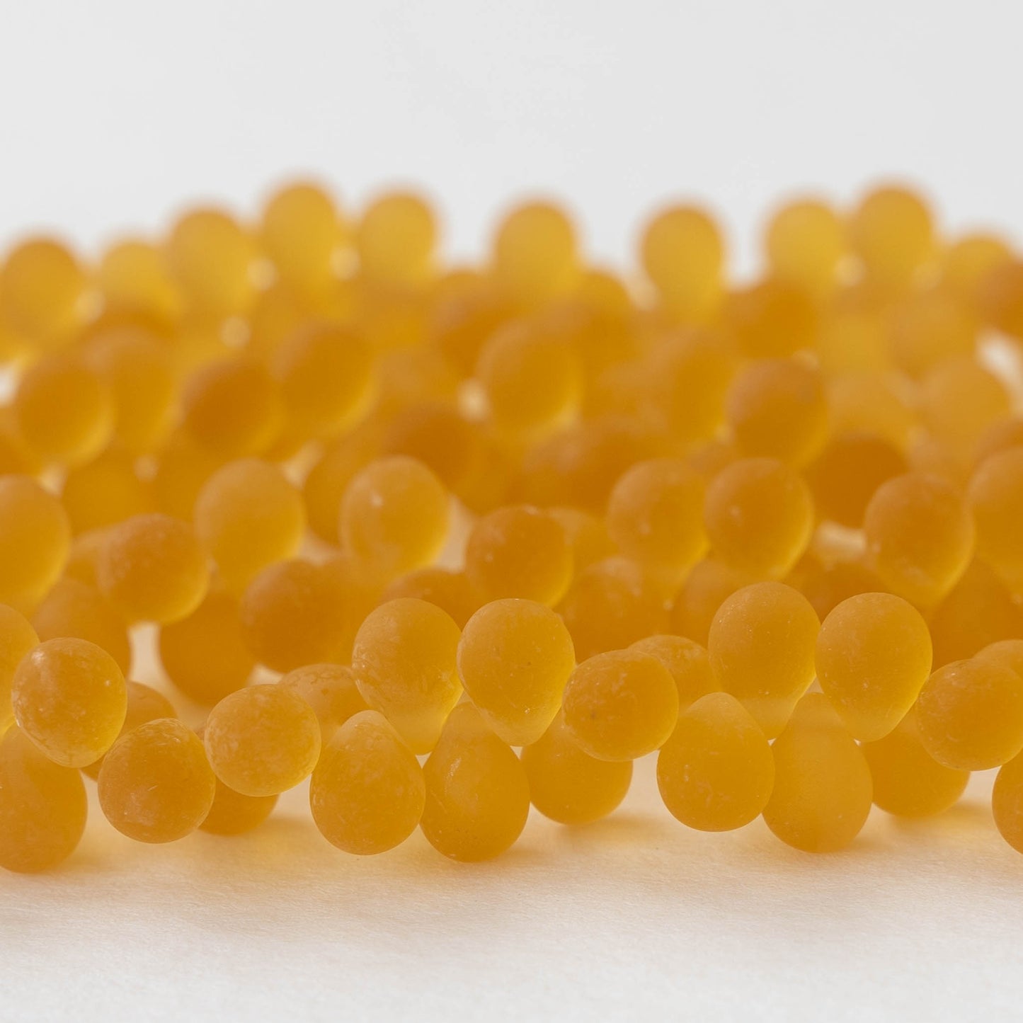 5x7mm Glass Teardrop Beads - Amber Matte - 50 Beads