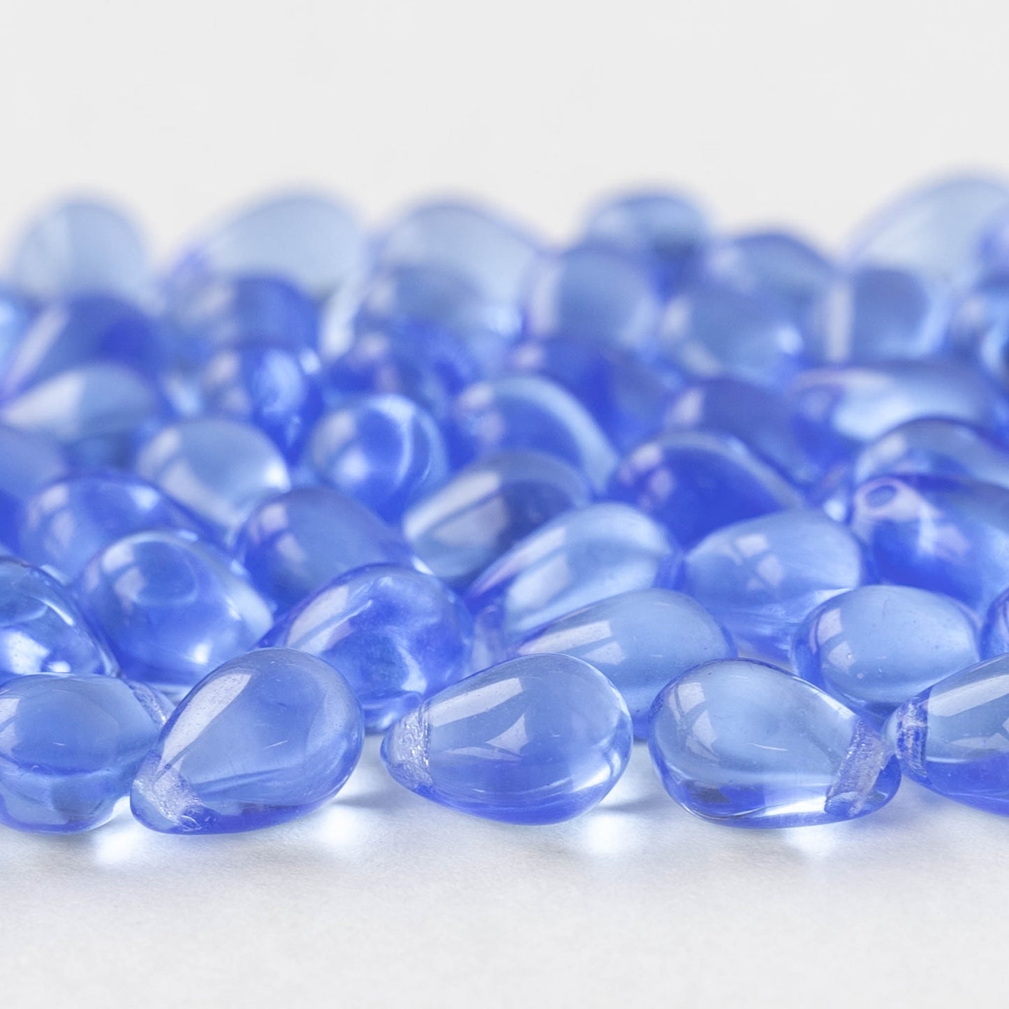 5x7mm Glass Teardrop Beads - Lt,. Sapphire Blue- 75 Beads