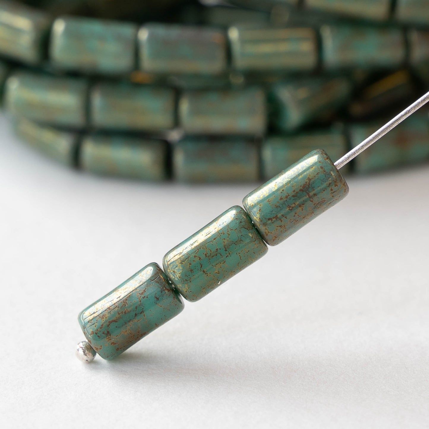 9mm Glass Tube Beads - Opaque Turquoise with Bronze - 16 Beads