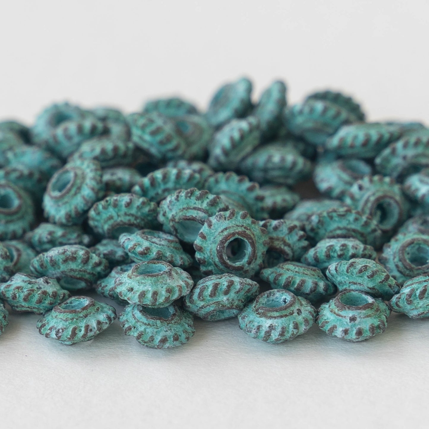Load image into Gallery viewer, 6.5mm Mykonos Metal Spacer Beads - Green Patina - 10 or 30
