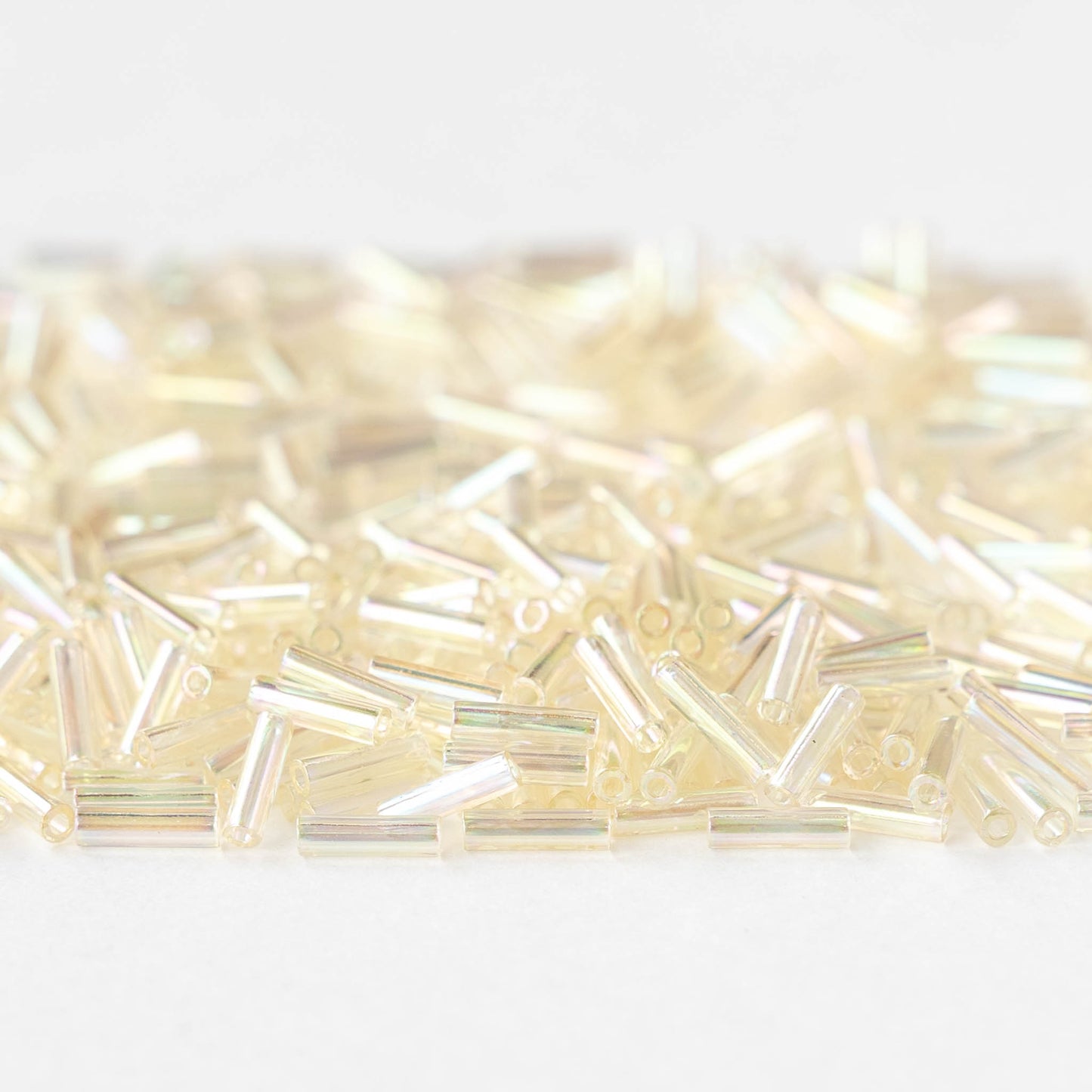 6mm Glass Bugle Beads - Crystal Ivory Gold Luster - 20 grams