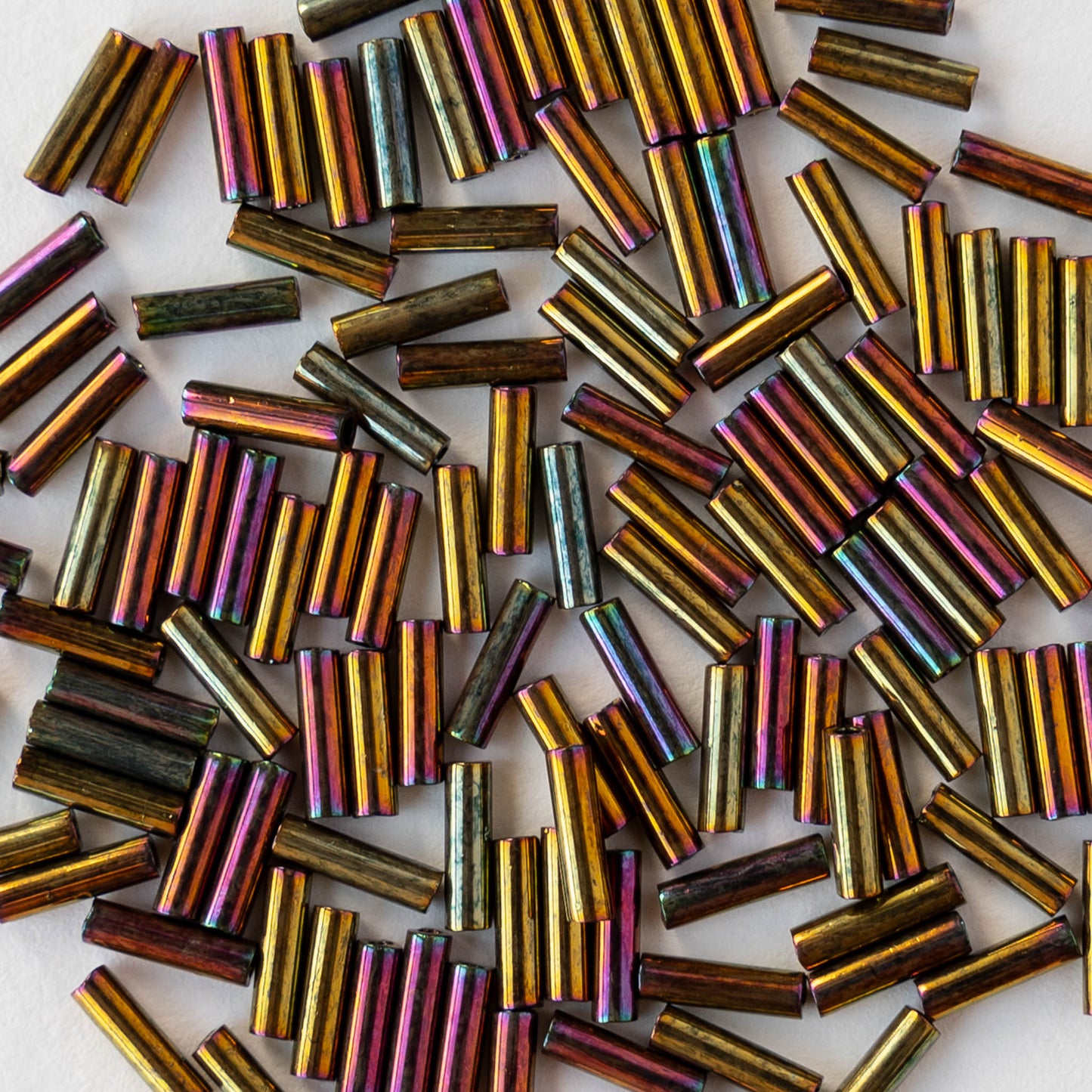 6mm Glass Bugle Beads - Metallic Gold Iris - 5 grams
