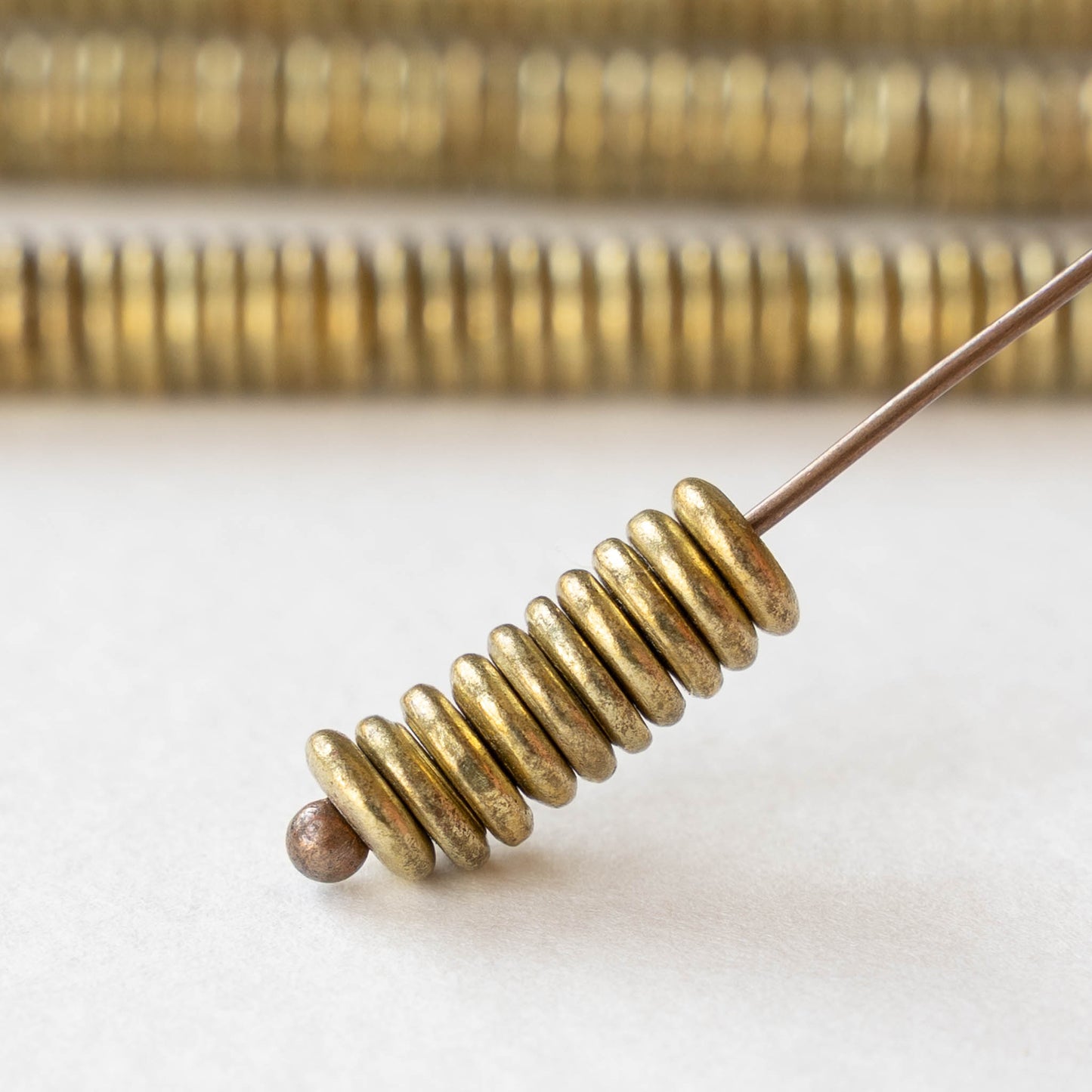 6mm Metal Disk Beads - Antique Brass - 3 inch strand ~40 beads
