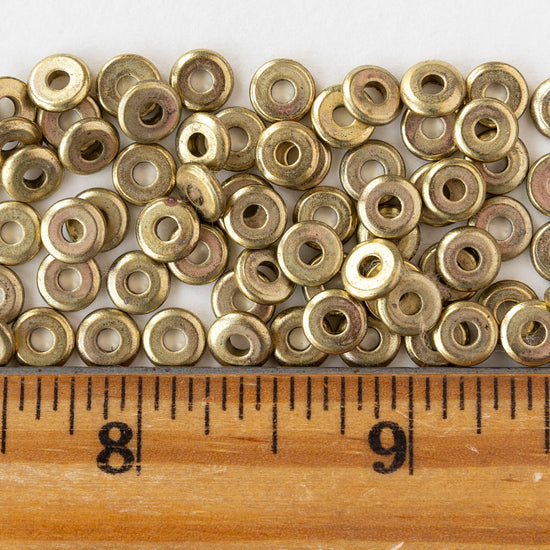6mm Metal Disk Beads - Antique Brass - 3 inch strand ~40 beads