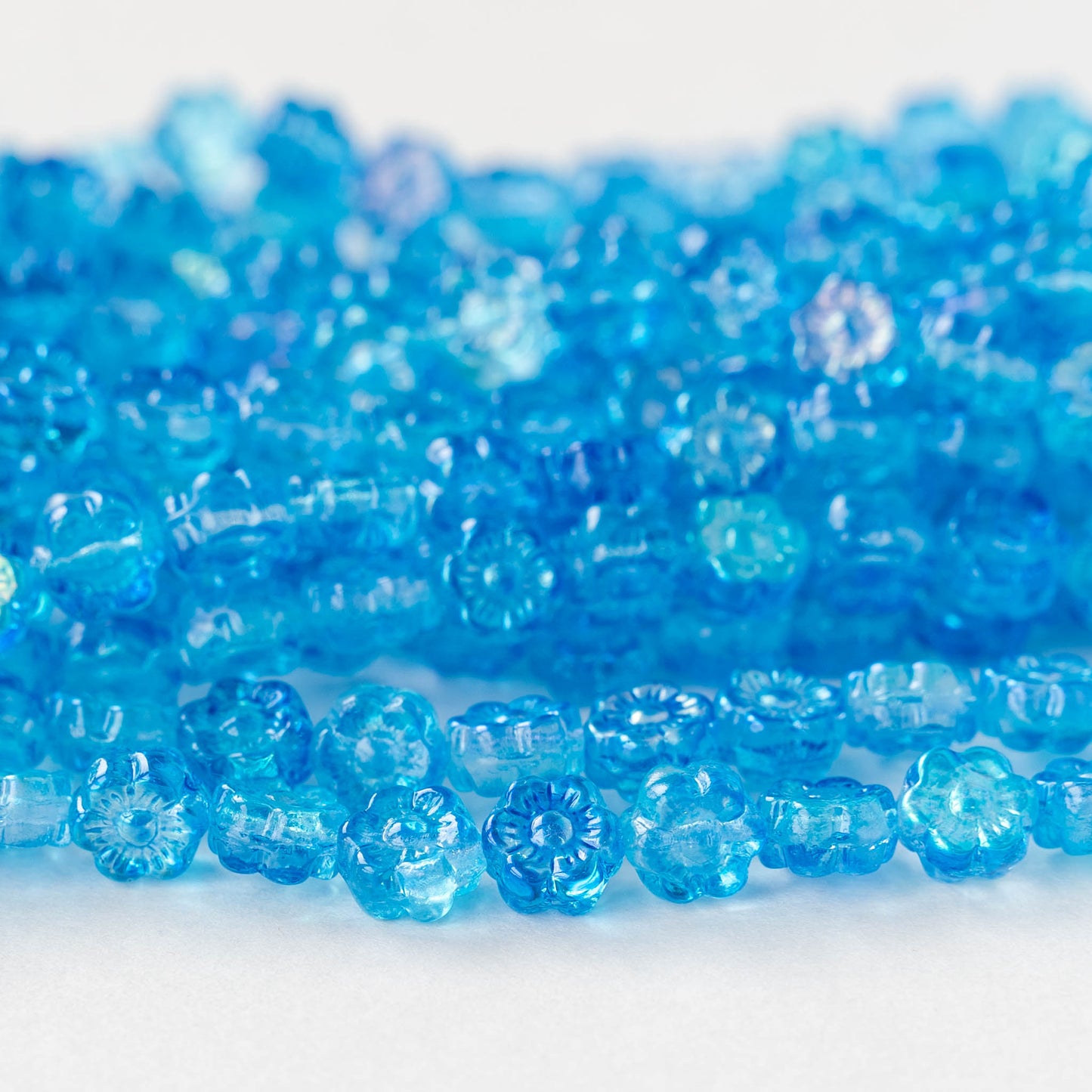 6mm Glass Flower Beads - Aqua Blue AB - 30 beads – funkyprettybeads