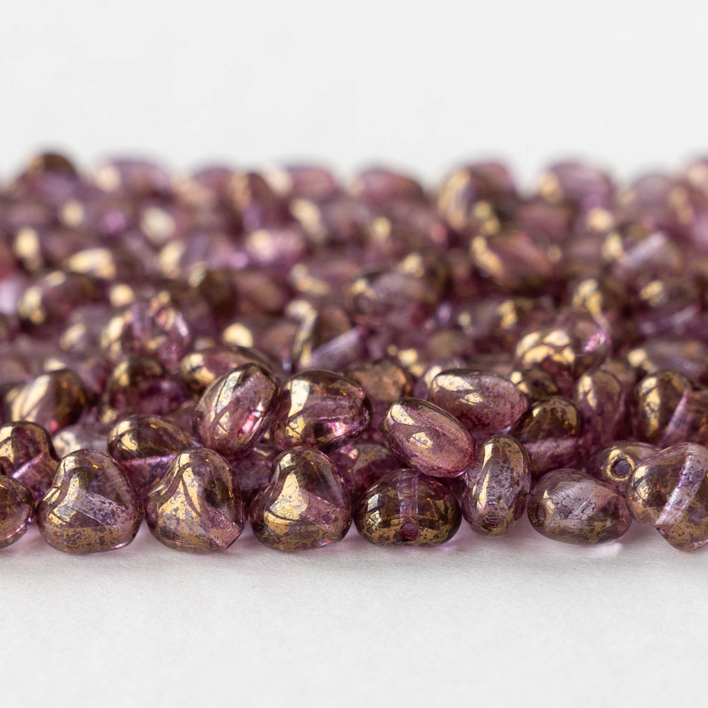 6mm Glass Heart Beads - Transparent Rose Gold - 25 hearts