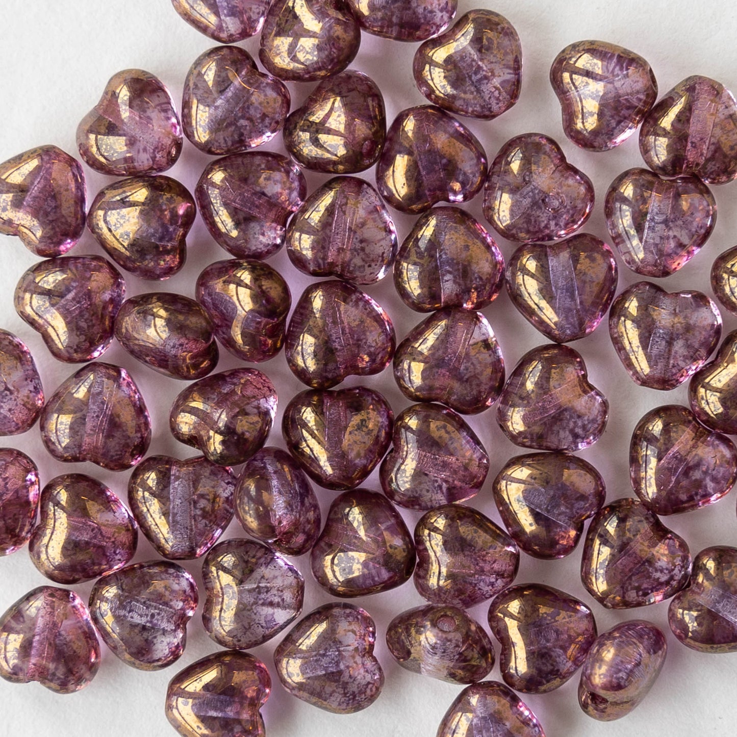 6mm Glass Heart Beads - Transparent Rose Gold - 25 hearts