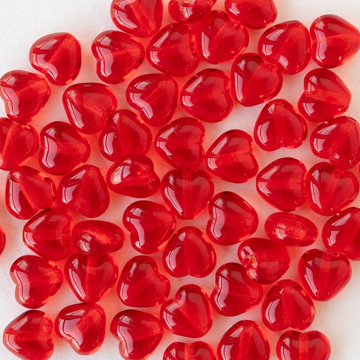 6mm Glass Heart Beads - Transparent Red - 25 hearts