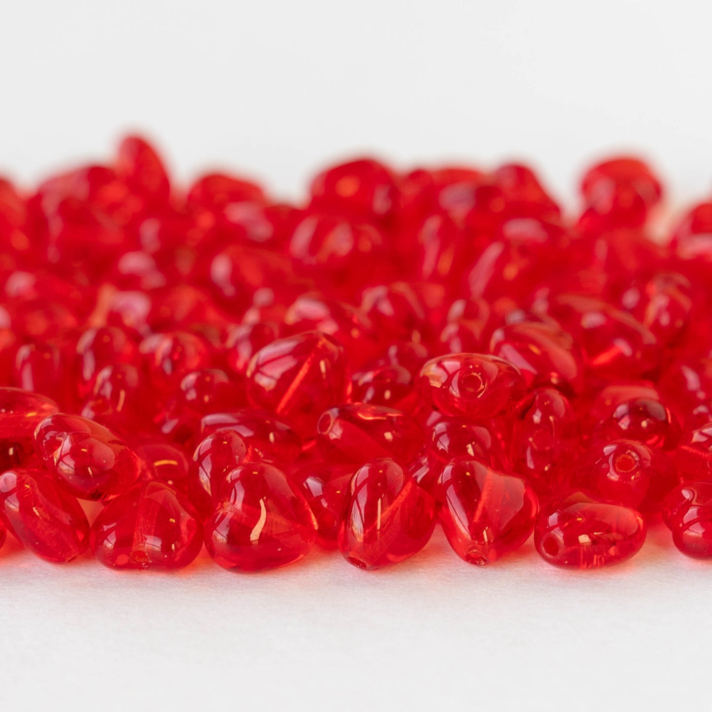 6mm Glass Heart Beads - Transparent Red - 25 hearts